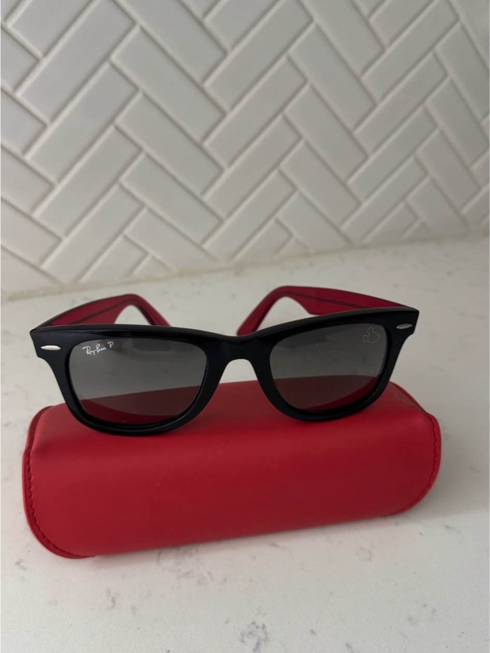 Ray-Ban Black Frame Sunglasses with Red Temples